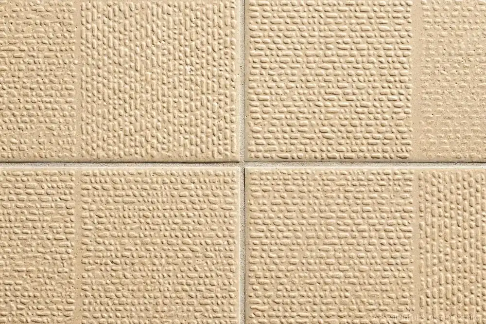 Close-up of textured slip-resistant bathroom floor tiles